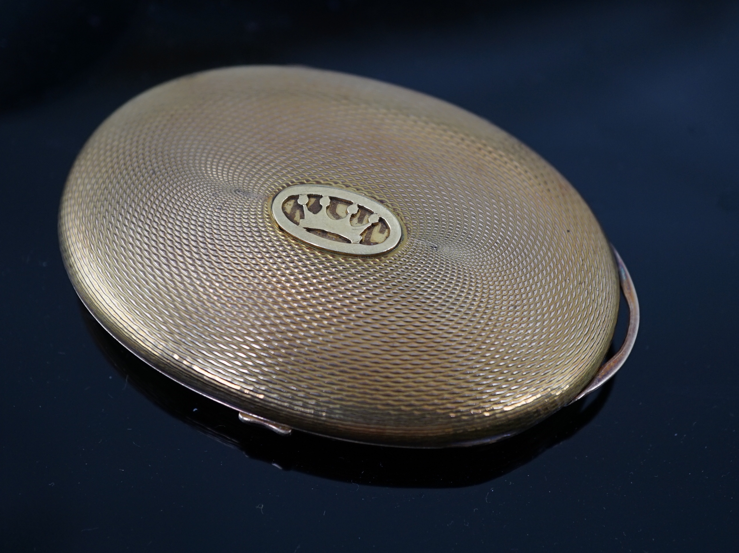 A pair of engraved gold mounted spectacles